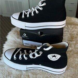 Converse Chuck Taylor high top sneakers in black size 9